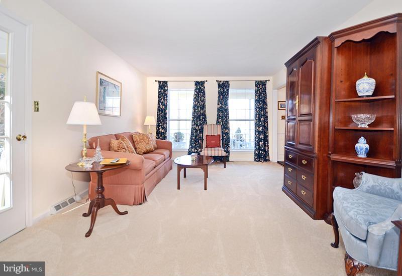 2415 Engle Road Fallston, MD 21047 - Photo 7 of 29 a living room with furniture a lamp and a large window