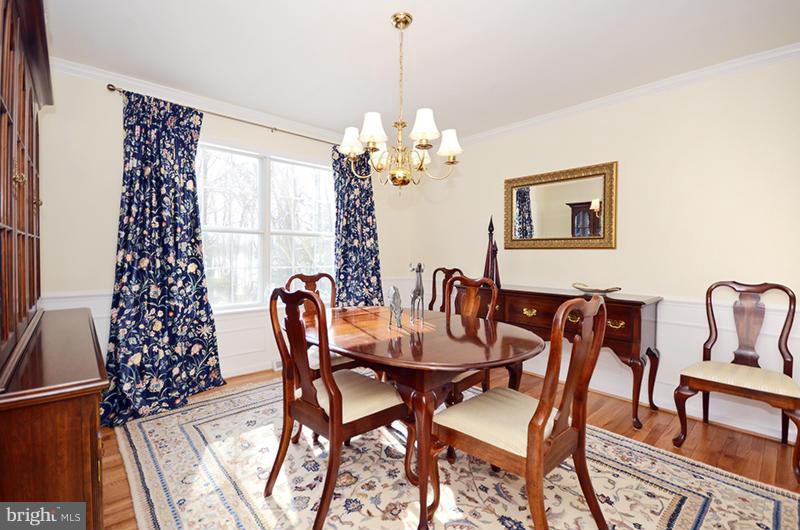 2415 Engle Road Fallston, MD 21047 - Photo 8 of 29 a dining room with furniture a chandelier and window