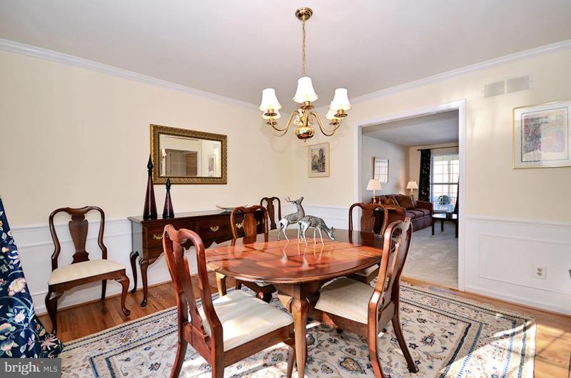 2415 Engle Road Fallston, MD 21047 - Photo 9 of 29 a view of a dining room with furniture and chandelier