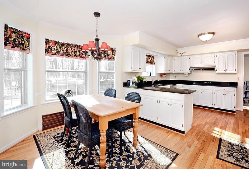 2415 Engle Road Fallston, MD 21047 - Photo 10 of 29 a kitchen with a table and chairs in it