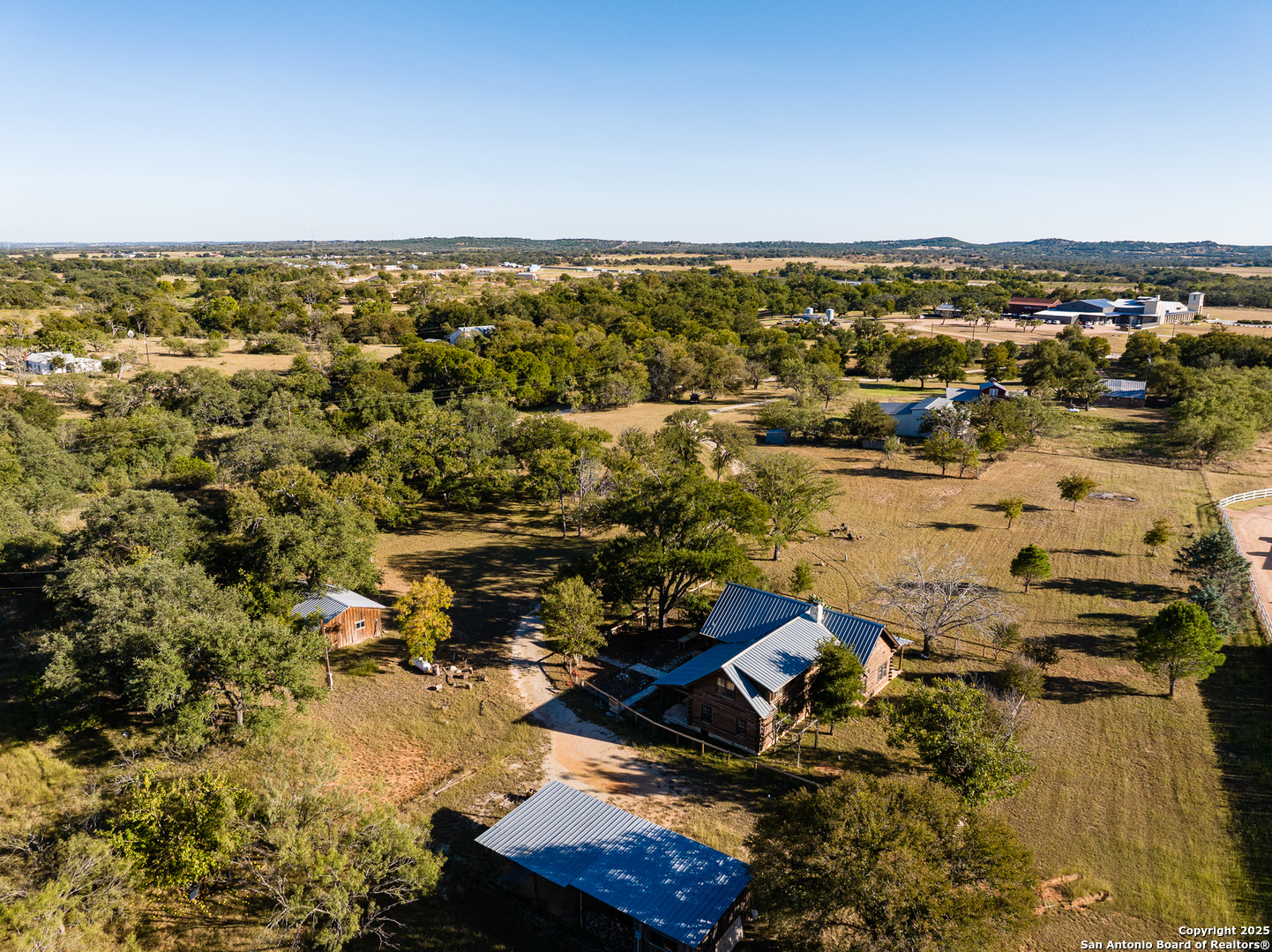387 Schmidtzinsky Road Fredericksburg, TX 78624 - Photo 19 of 37 an aerial view of multiple house