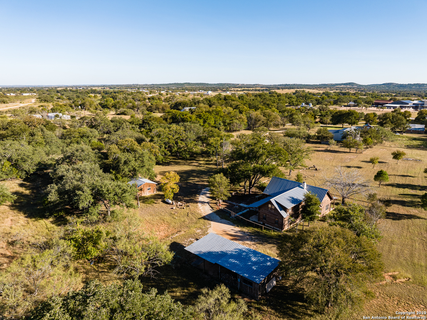 387 Schmidtzinsky Road Fredericksburg, TX 78624 - Photo 20 of 37 an aerial view of multiple house