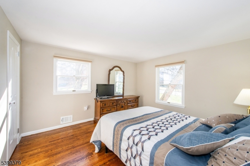 21 Dolly Road Parsippany, NJ 07054 - Photo 25 of 35 a bedroom with a bed and a window