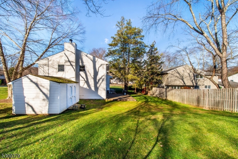 21 Dolly Road Parsippany, NJ 07054 - Photo 29 of 35 a view of a house with a yard
