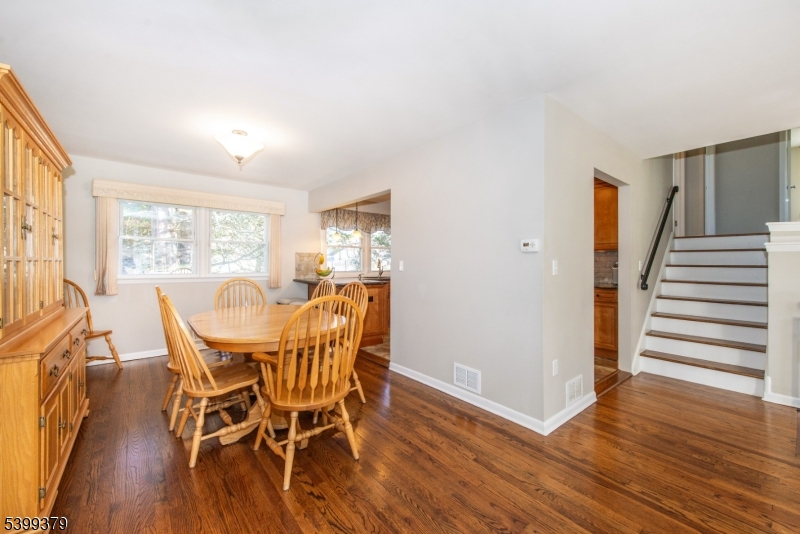 21 Dolly Road Parsippany, NJ 07054 - Photo 9 of 35 a view of a dining room with furniture and wooden floor