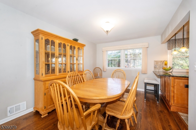 21 Dolly Road Parsippany, NJ 07054 - Photo 10 of 35 a dining room with furniture and wooden floor