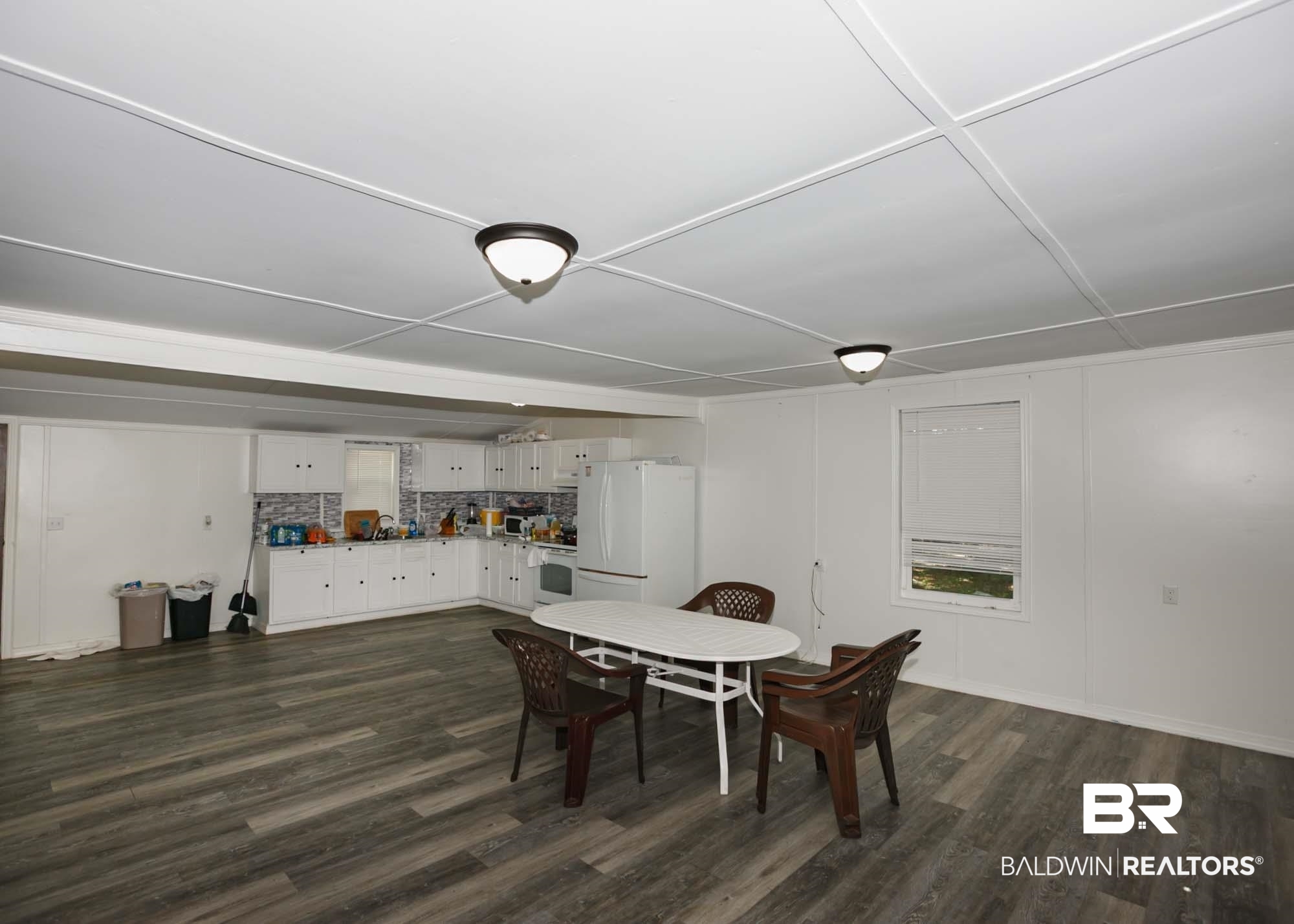11998 Workman Avenue Foley, AL 36535 - Photo 12 of 59 Dining space featuring dark wood-style floors