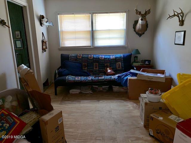 3229 Hamlin Road Lizella, GA 31052 - Photo 13 of 23 a bedroom with furniture and a window