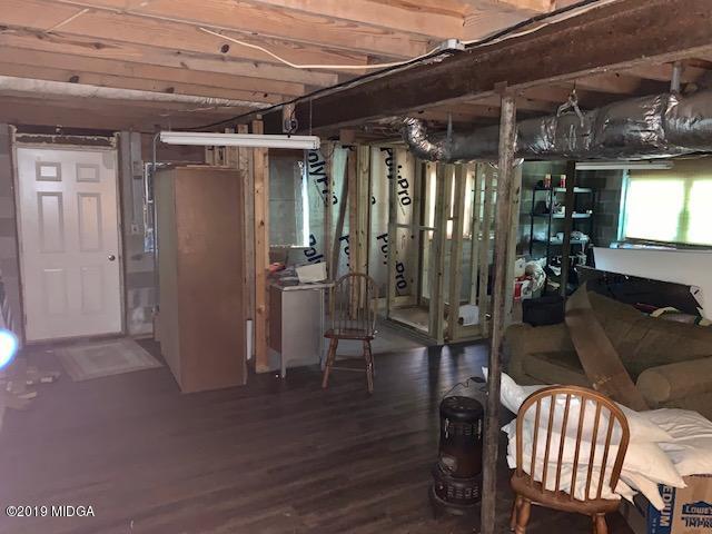 3229 Hamlin Road Lizella, GA 31052 - Photo 17 of 23 a view of entryway and hall with wooden floor