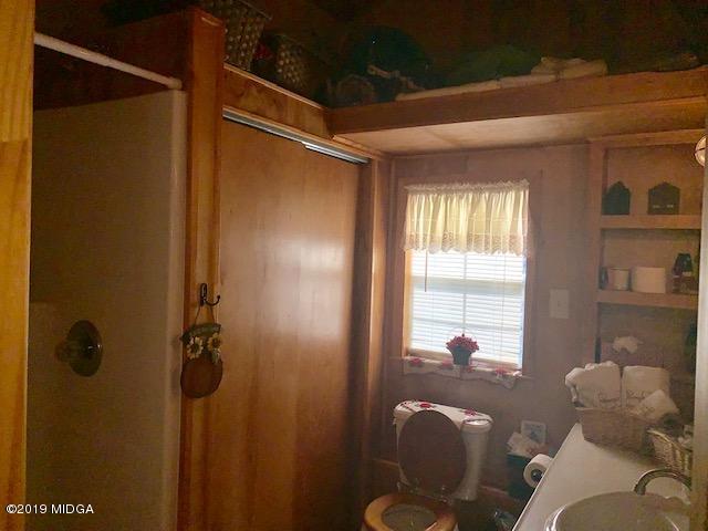 3229 Hamlin Road Lizella, GA 31052 - Photo 22 of 23 a living room with furniture and a window