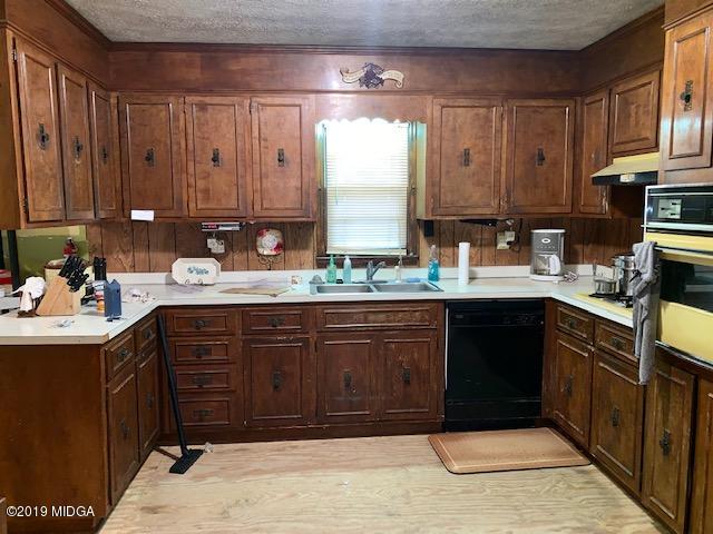 3229 Hamlin Road Lizella, GA 31052 - Photo 9 of 23 a bathroom with a sink double vanity and a mirror