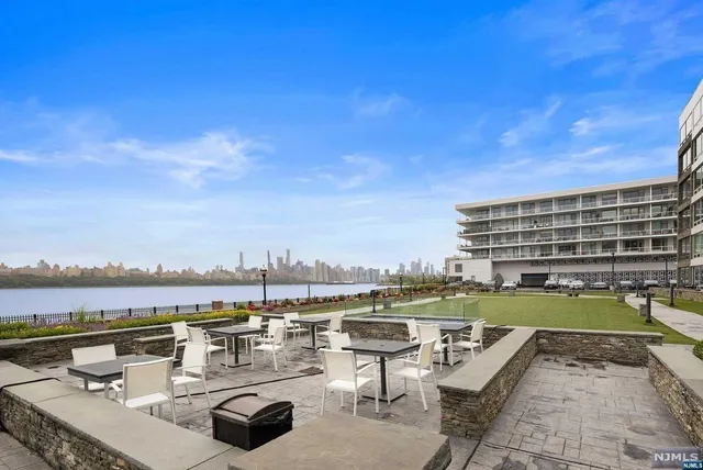 a view of a lake with couches