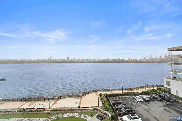 a view of a lake with a big yard