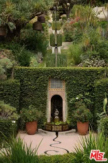 a view of a backyard of white house