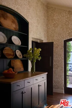 a kitchen with a sink and a stove