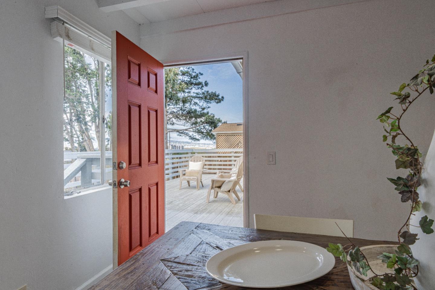 1915 Grandview Street Seaside, CA 93955 - Photo 16 of 29 a bathroom with a toilet a sink and a mirror