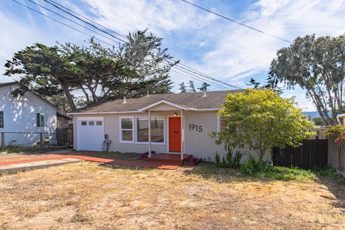 1915 Grandview Street Seaside, CA 93955 - Photo 5 of 29 a view of a house with a yard