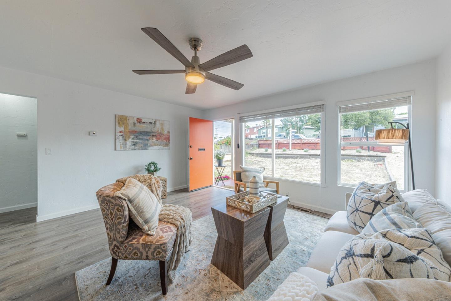 1915 Grandview Street Seaside, CA 93955 - Photo 8 of 29 a living room with furniture and a large window
