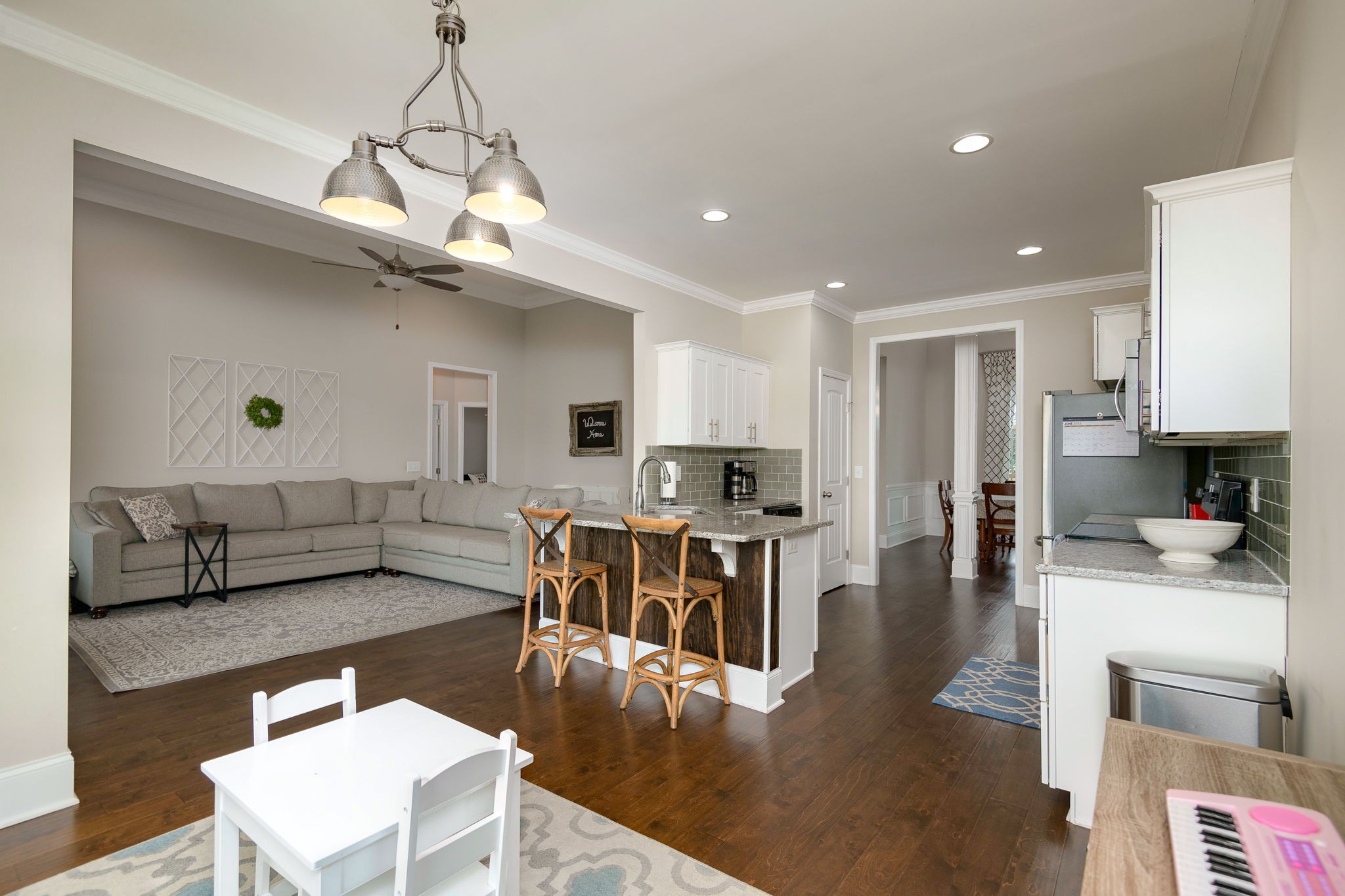 2251 Bluebird Road Lebanon, TN 37087 - Photo 22 of 62 a living room with furniture kitchen view and a wooden floor