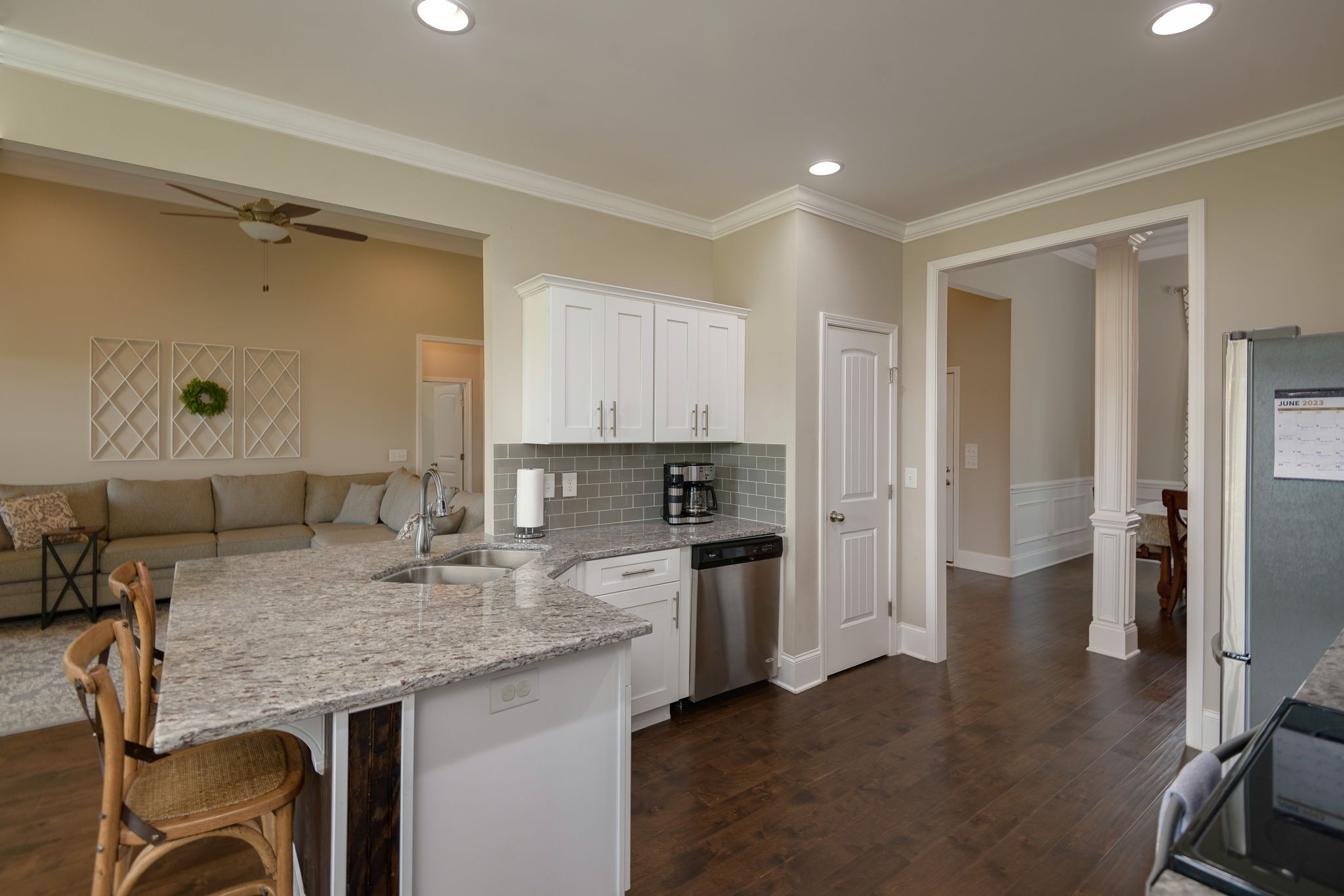 2251 Bluebird Road Lebanon, TN 37087 - Photo 26 of 62 a kitchen with granite countertop a sink refrigerator and cabinets