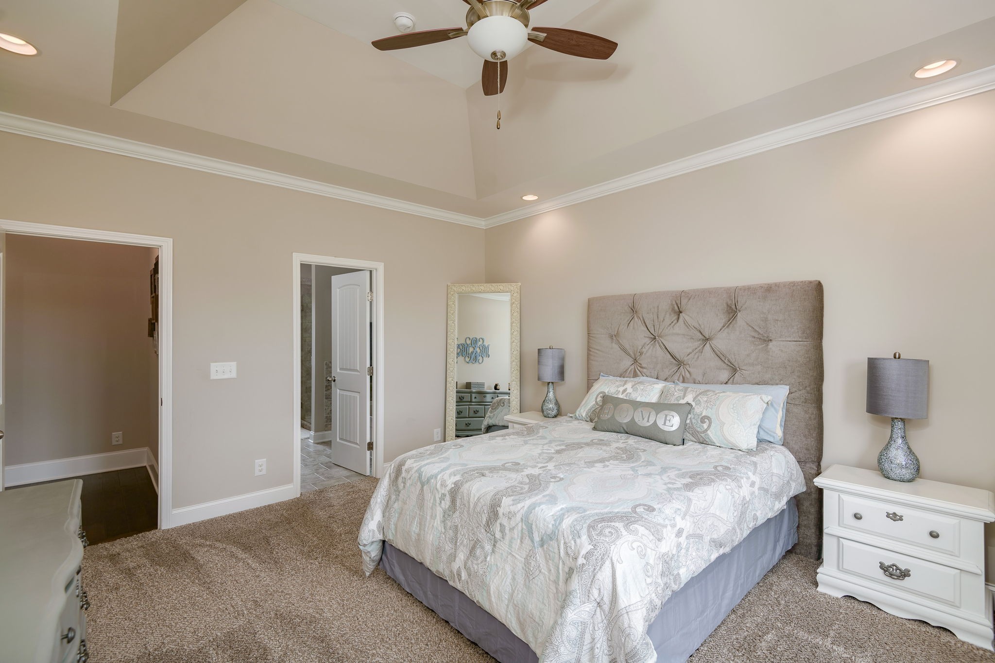 2251 Bluebird Road Lebanon, TN 37087 - Photo 33 of 62 a bedroom with a bed and a chandelier