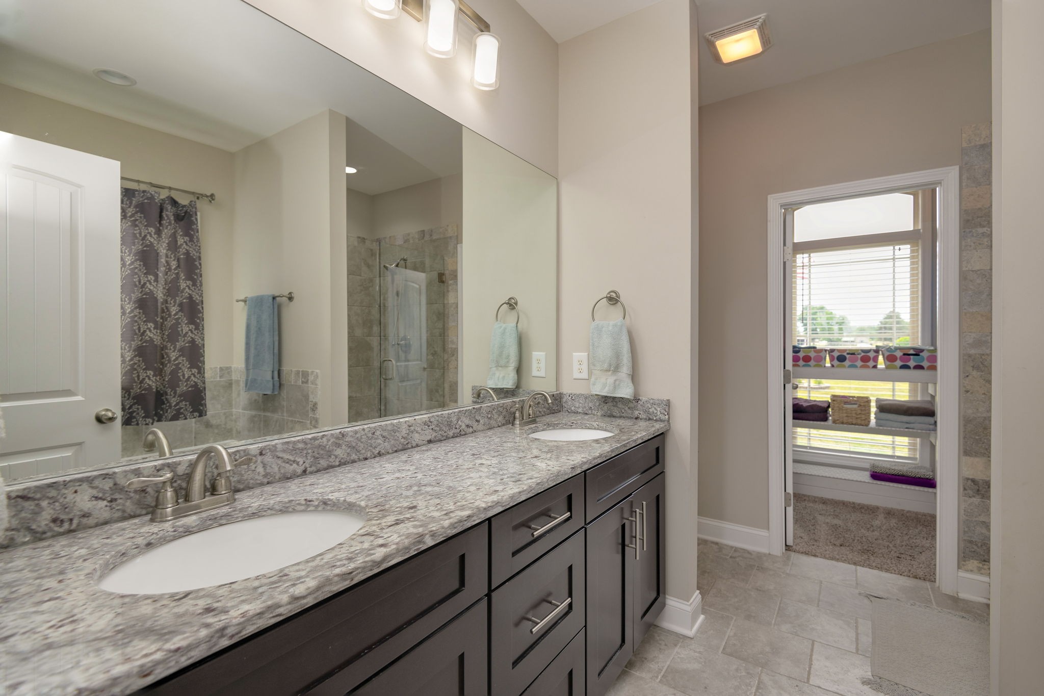 2251 Bluebird Road Lebanon, TN 37087 - Photo 34 of 62 a bathroom with a granite countertop sink and a mirror