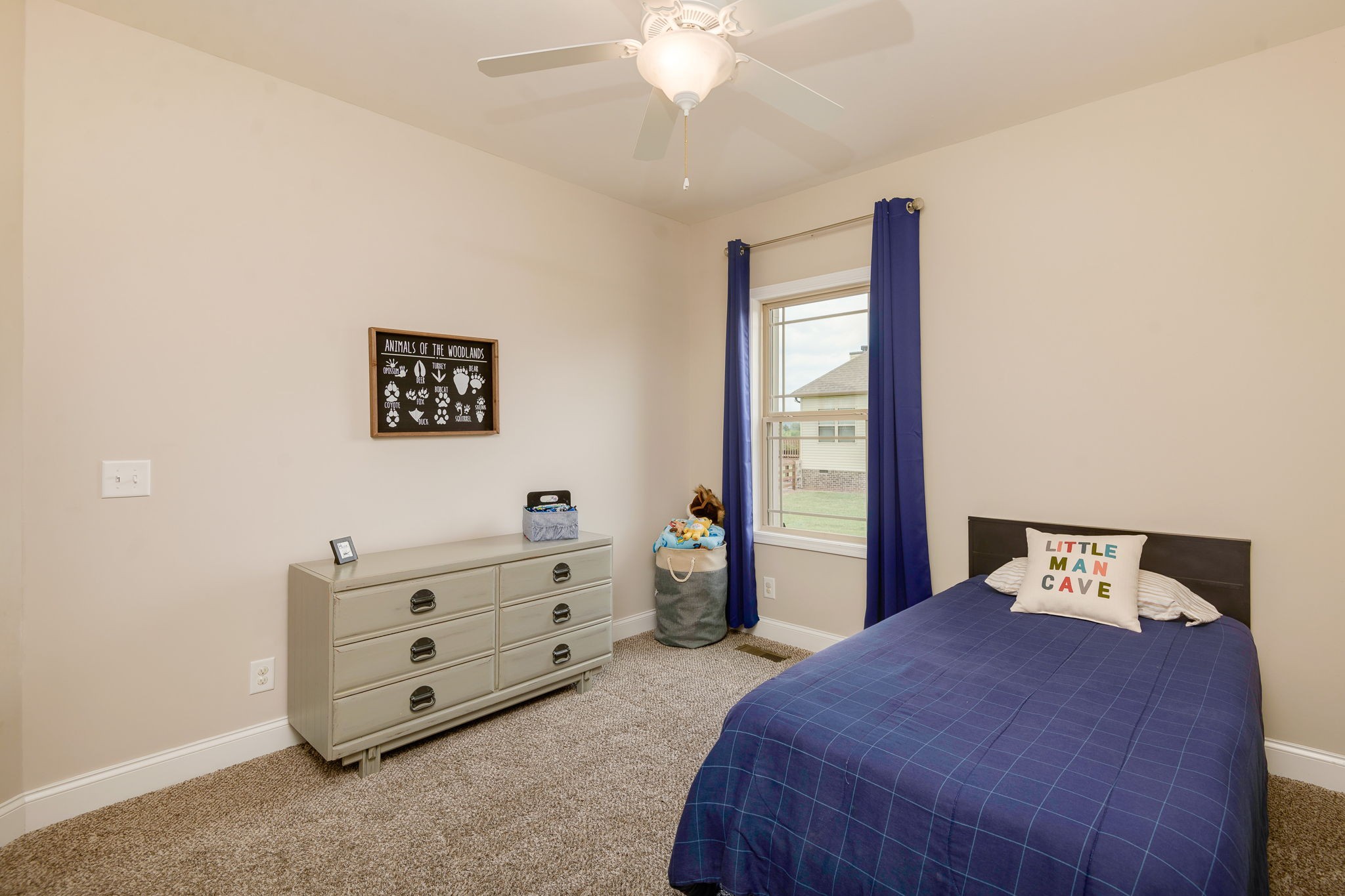 2251 Bluebird Road Lebanon, TN 37087 - Photo 39 of 62 a bedroom with a bed and a window