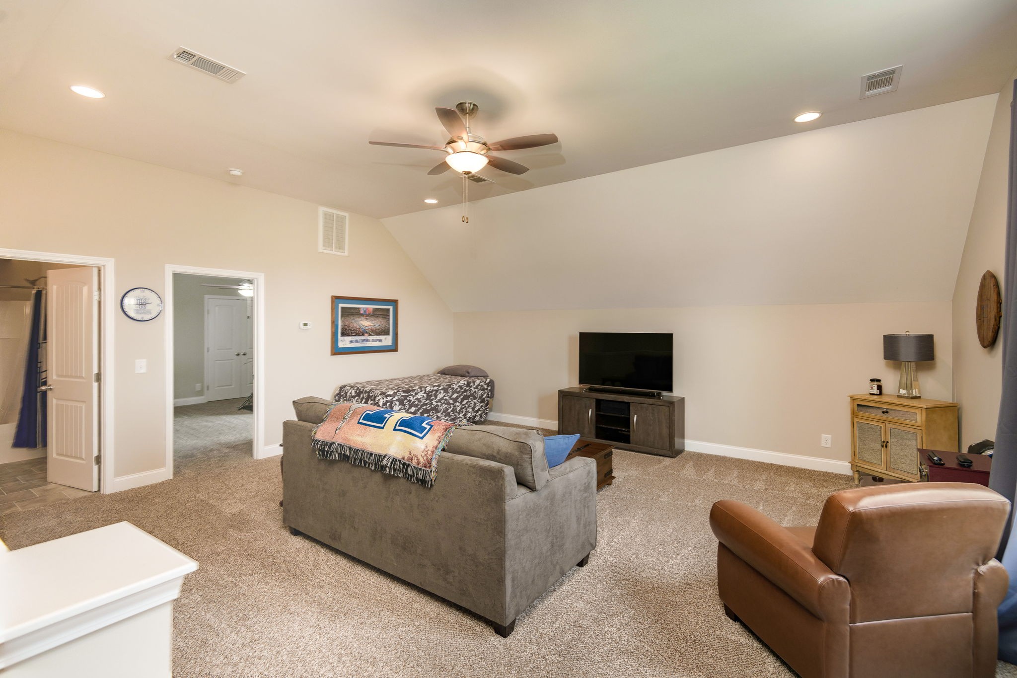 2251 Bluebird Road Lebanon, TN 37087 - Photo 46 of 62 a living room with furniture and a flat screen tv