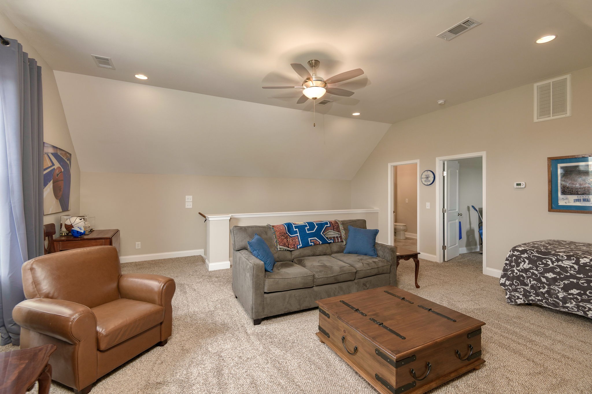 2251 Bluebird Road Lebanon, TN 37087 - Photo 47 of 62 a living room with furniture ceiling fan and a rug