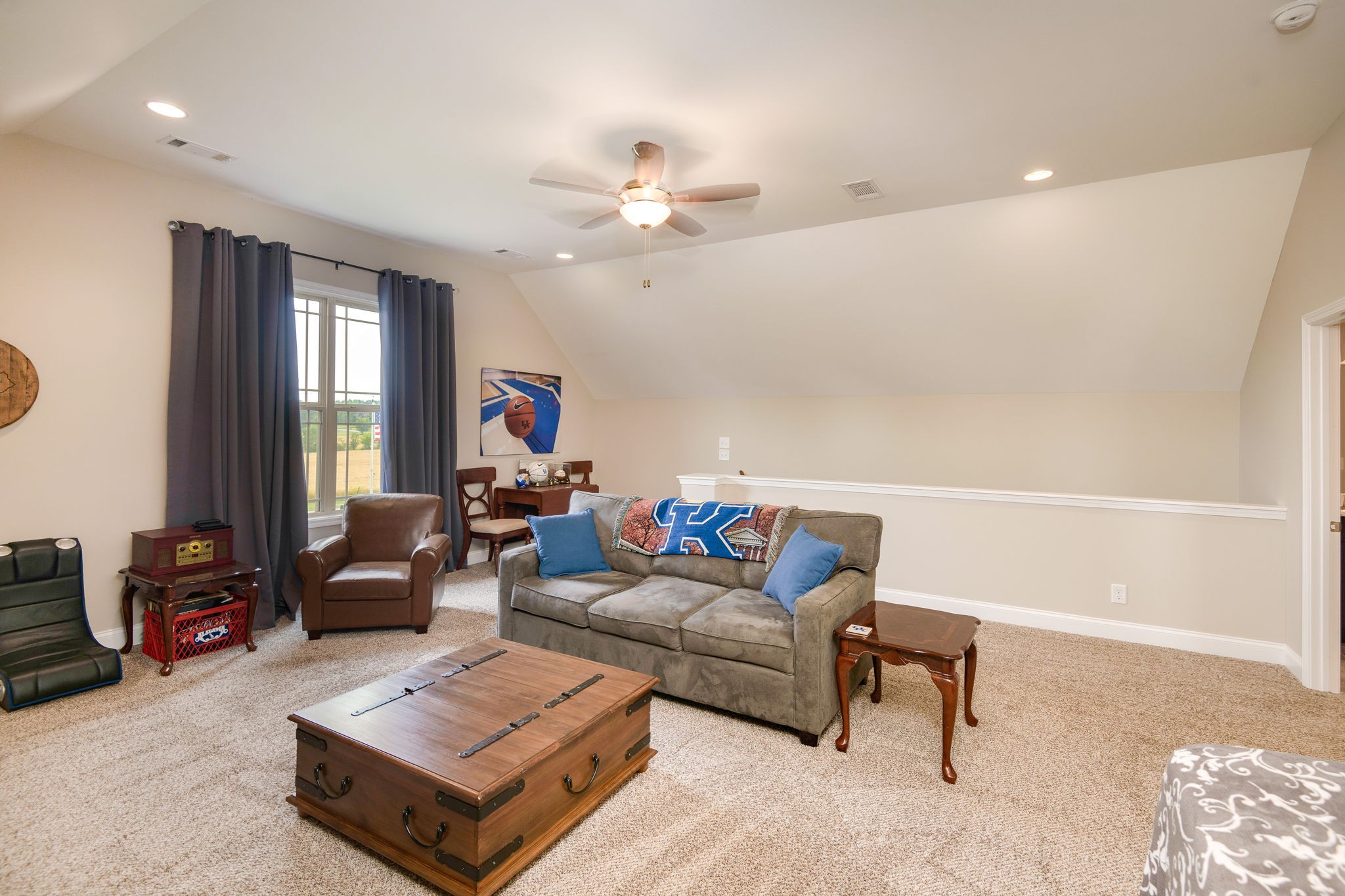 2251 Bluebird Road Lebanon, TN 37087 - Photo 48 of 62 a living room with furniture and a chandelier