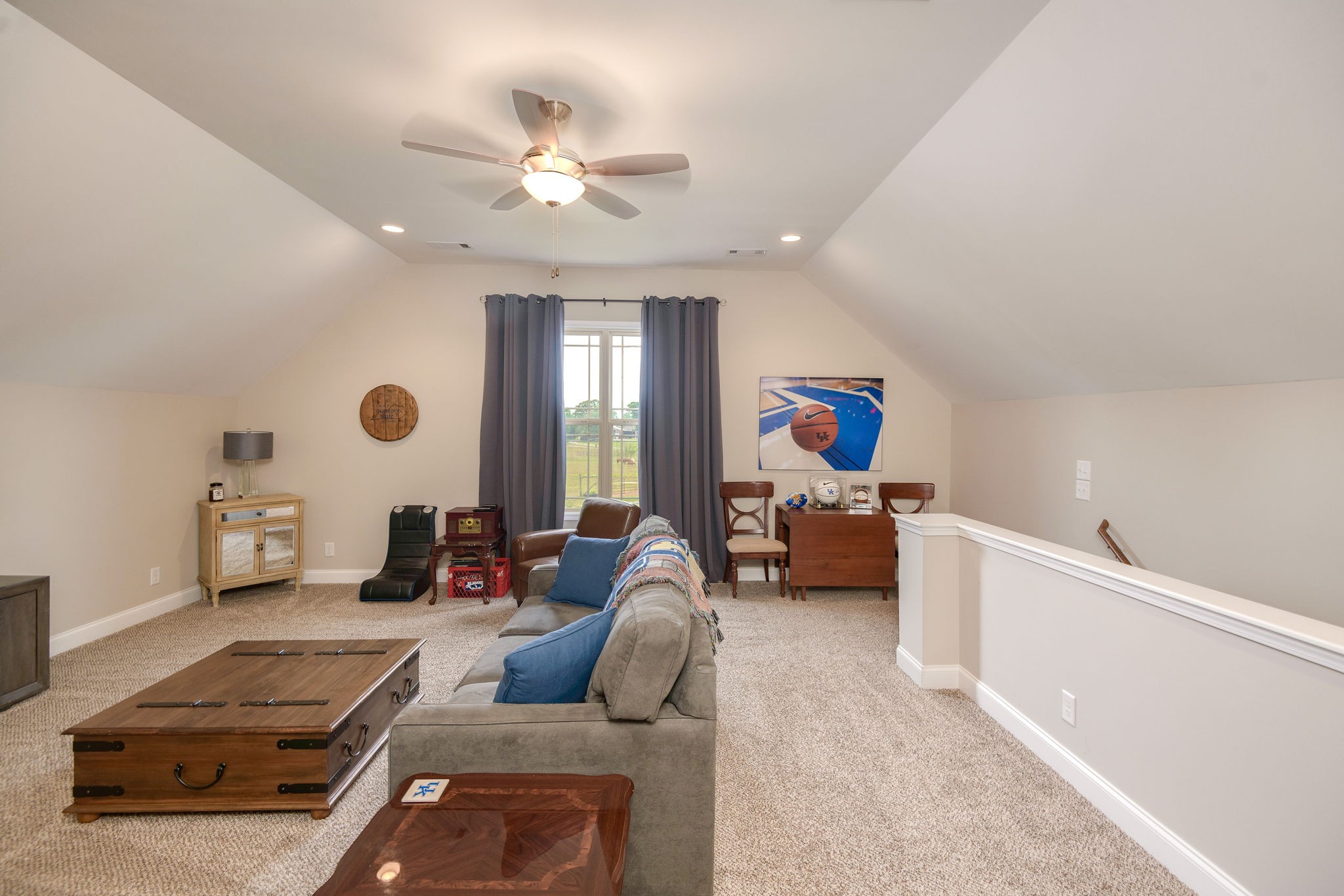 2251 Bluebird Road Lebanon, TN 37087 - Photo 49 of 62 a living room with furniture and a chandelier