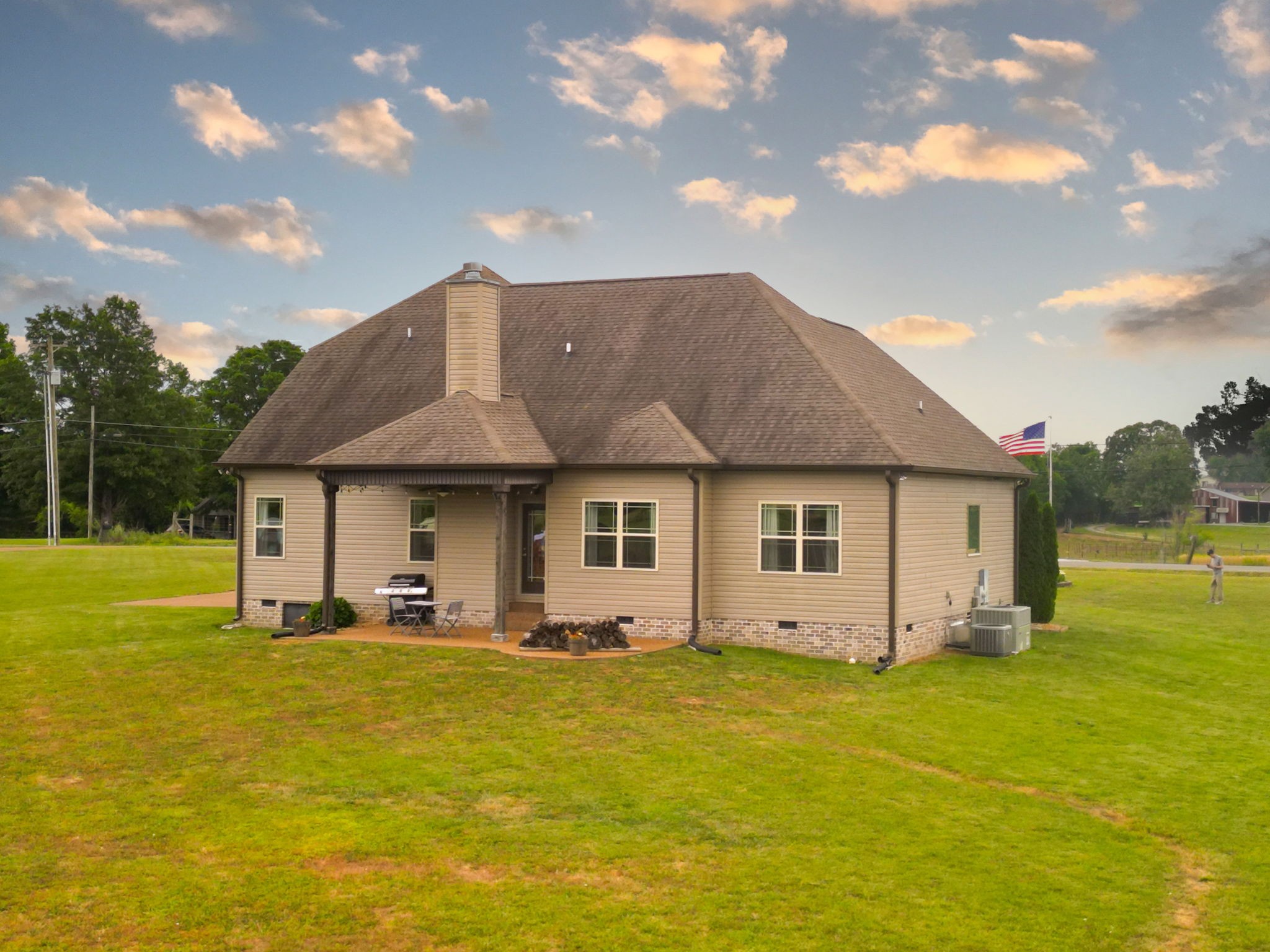 2251 Bluebird Road Lebanon, TN 37087 - Photo 5 of 62 a front view of house with yard and trees in the background