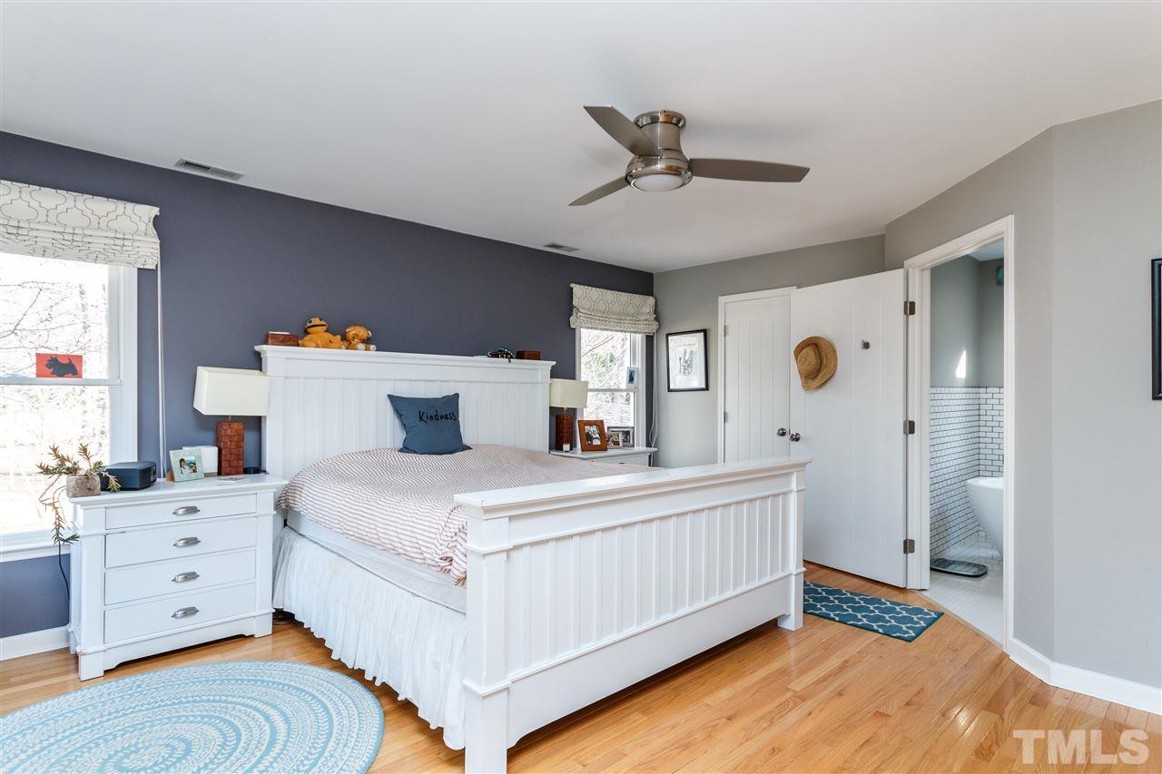 3412 1st Place Raleigh, NC 27613 - Photo 15 of 25 Well appointed Master Suite with flowing hardwoods and updated Master Bath. Redesigned this area to improve the flow between the bedroom and en-suite.