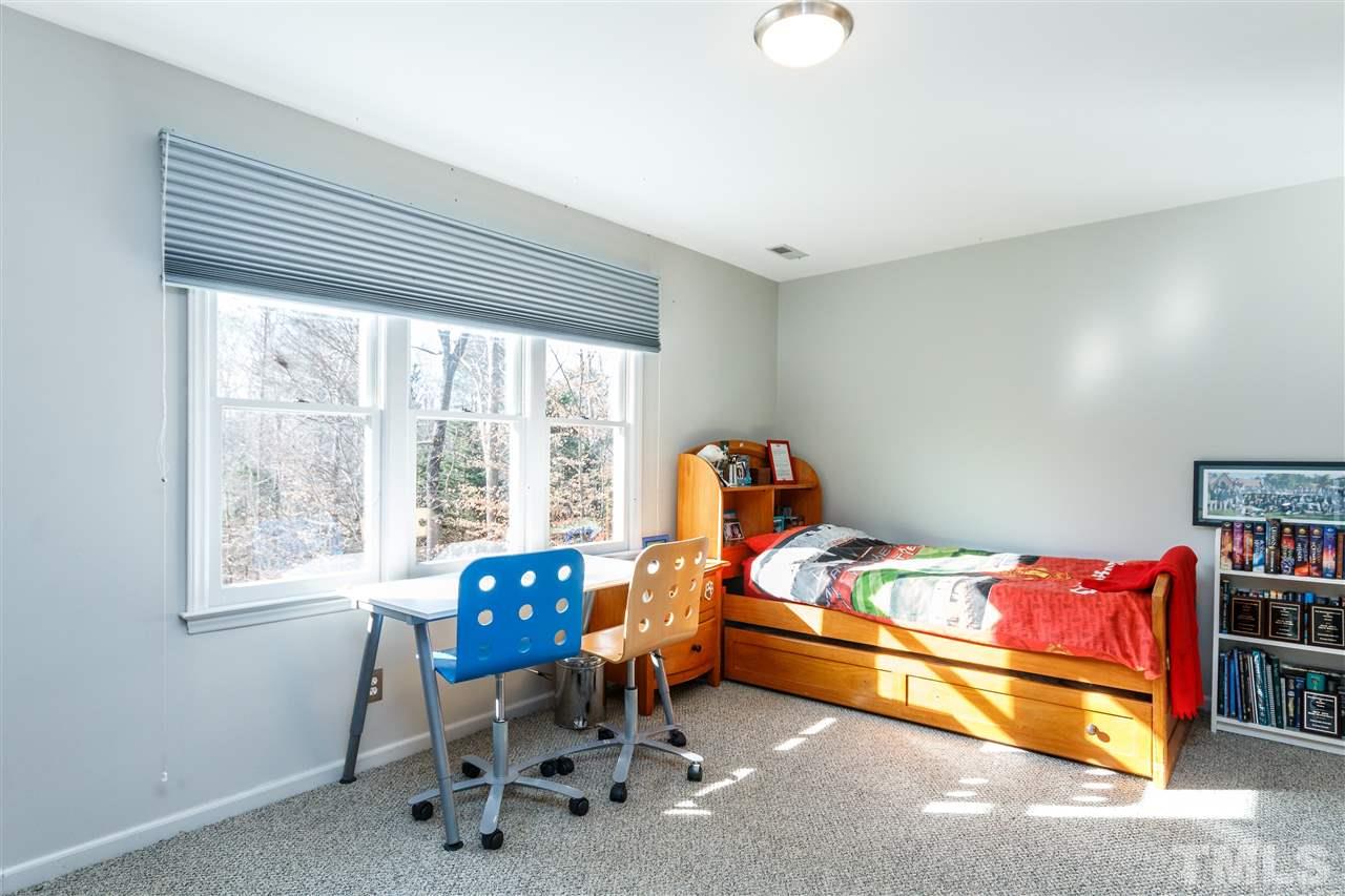 3412 1st Place Raleigh, NC 27613 - Photo 19 of 25 Large bedroom with lots of natural lighting and carpet to keep the feet warm in the cool mornings.