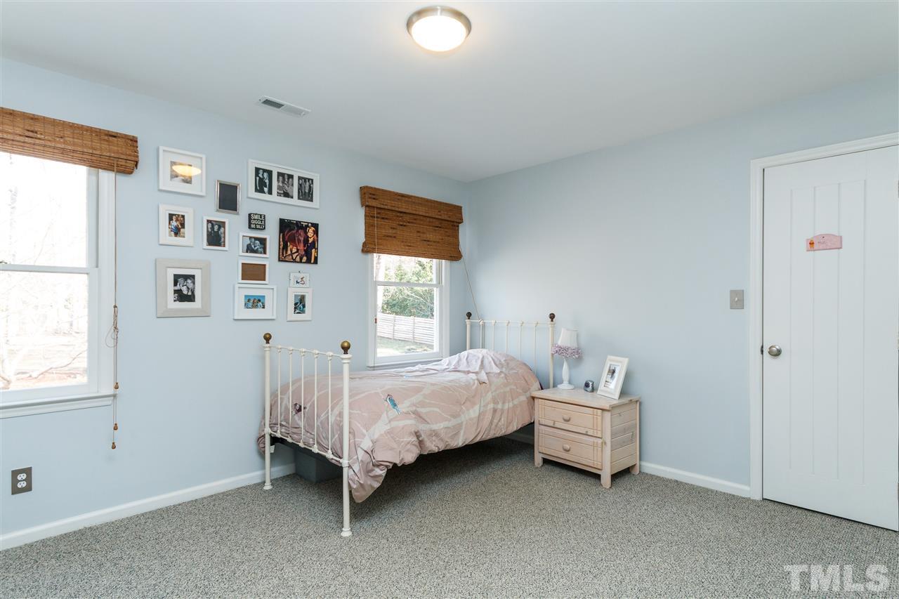 3412 1st Place Raleigh, NC 27613 - Photo 21 of 25 Sizable room with 2 windows and carpet.