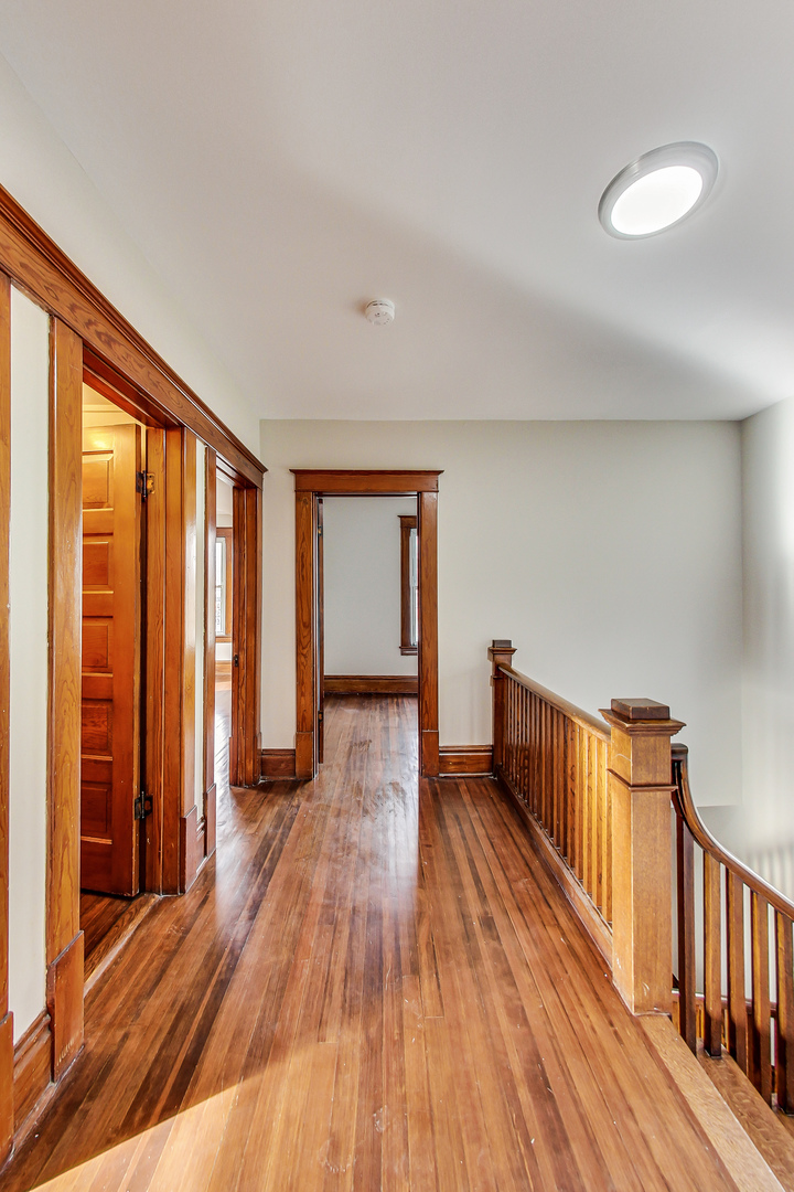 207 Center Road Frankfort, IL 60423 - Photo 19 of 41 a view of hallway with wooden floor