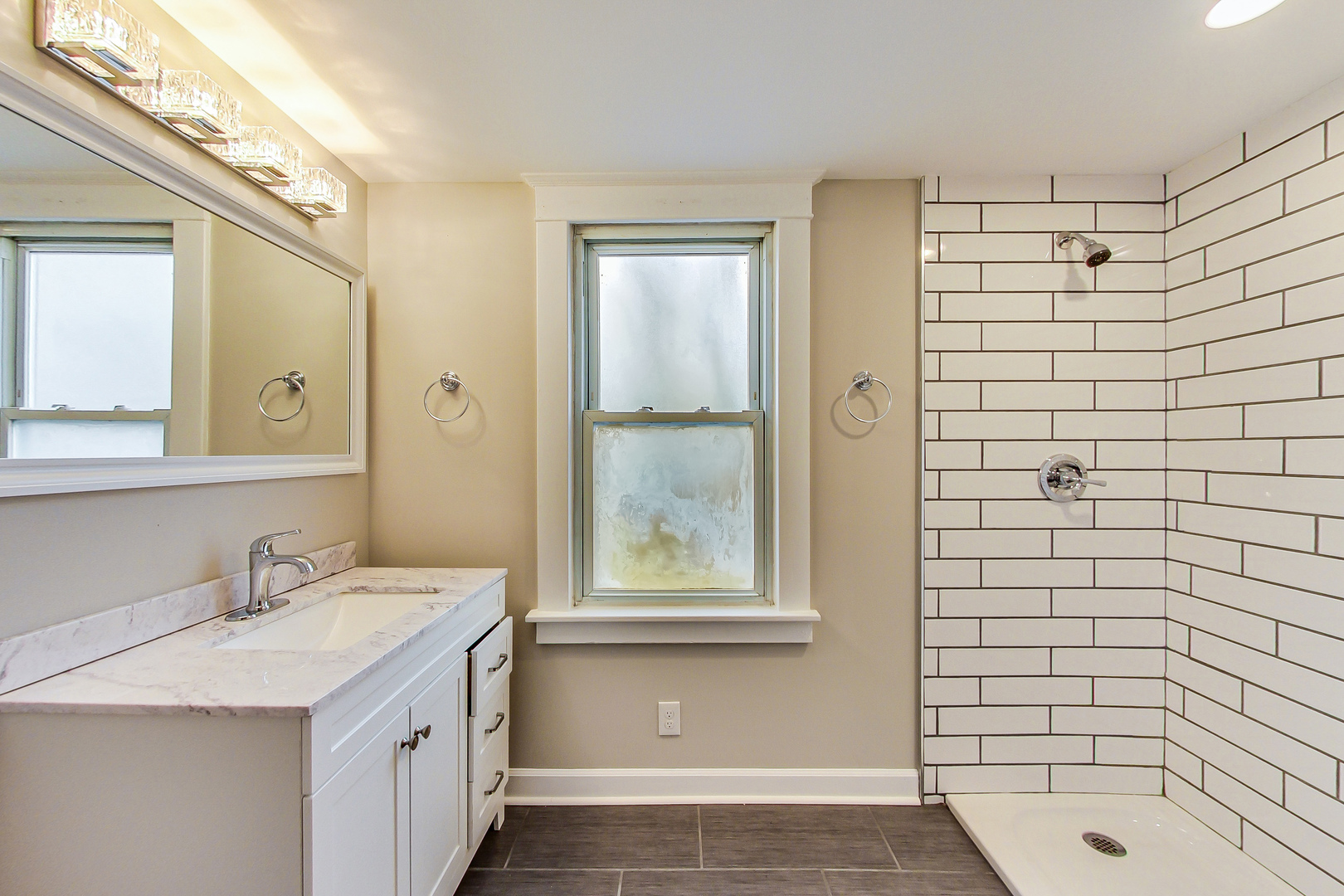 207 Center Road Frankfort, IL 60423 - Photo 23 of 41 a bathroom with a sink a toilet and shower