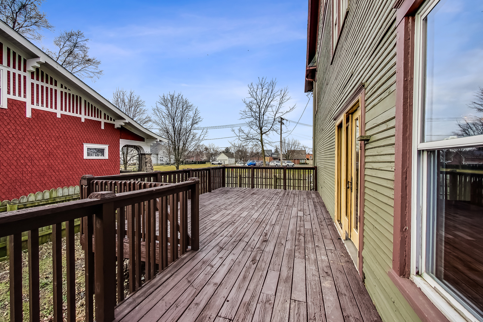 207 Center Road Frankfort, IL 60423 - Photo 29 of 41 a balcony view with a wooden floor and city view