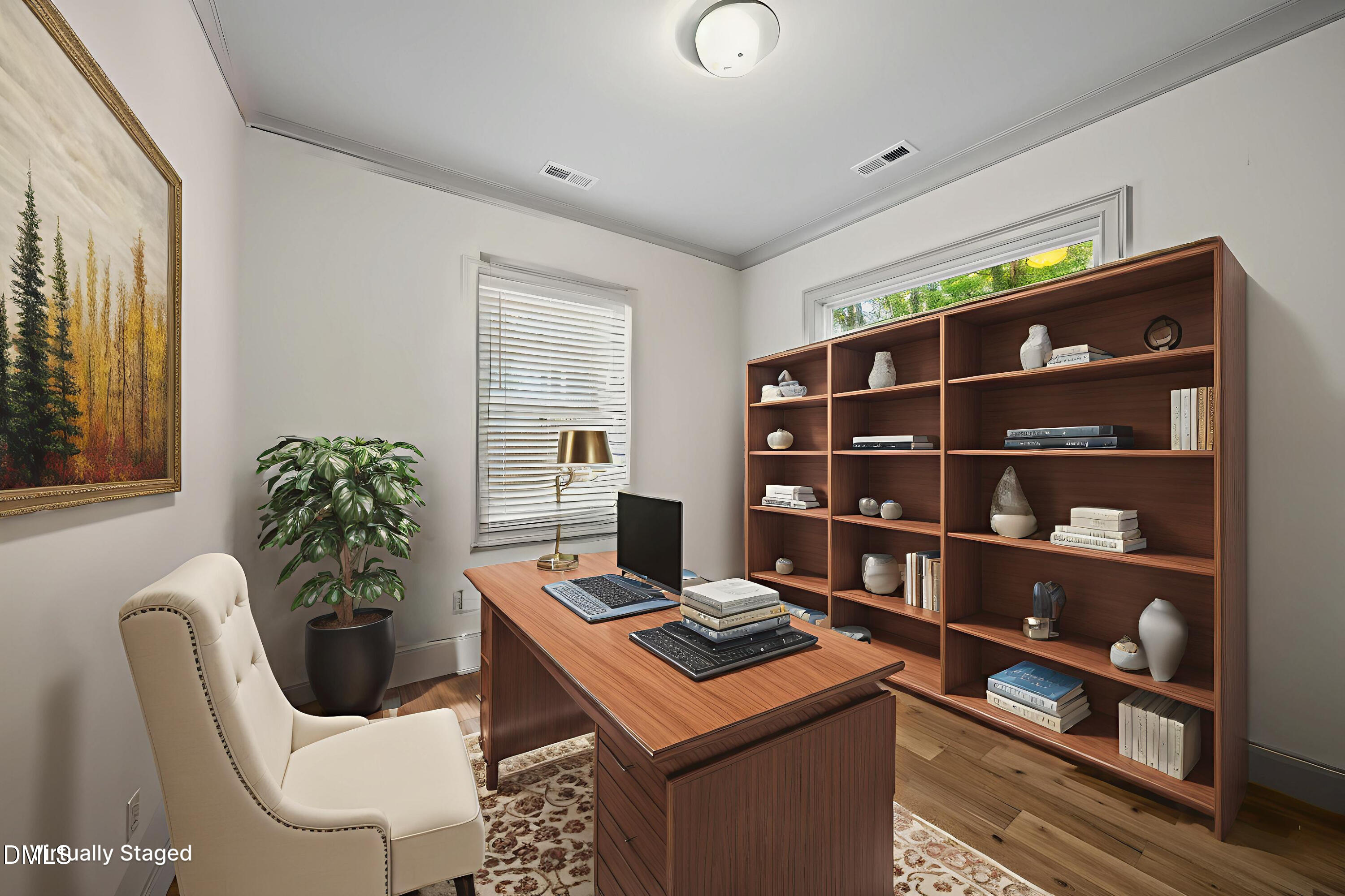 1501 Beauty Avenue Raleigh, NC 27610 - Photo 13 of 30 a room with furniture a bookshelf and a window