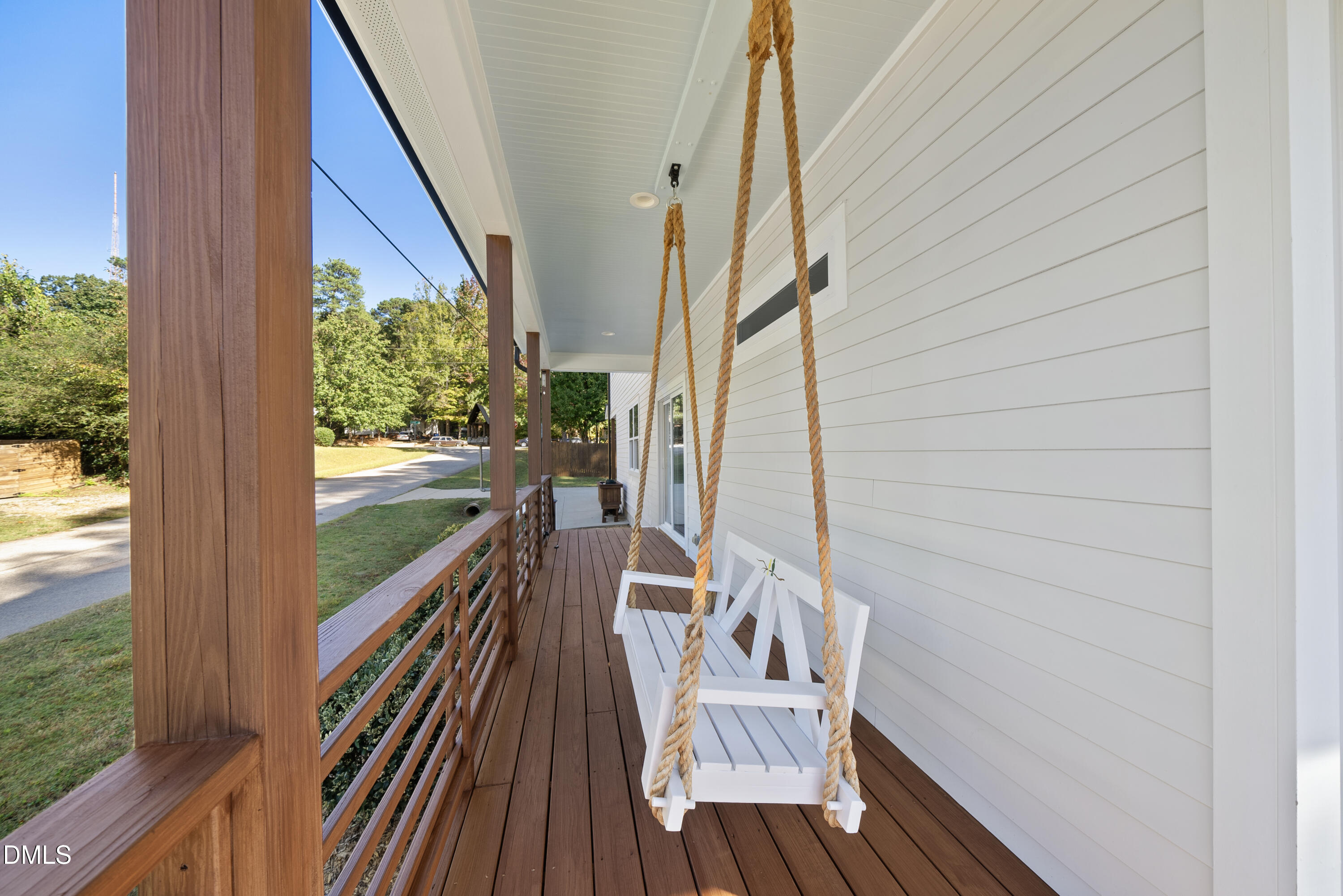 1501 Beauty Avenue Raleigh, NC 27610 - Photo 24 of 30 a view of balcony with wooden floor and outdoor seating