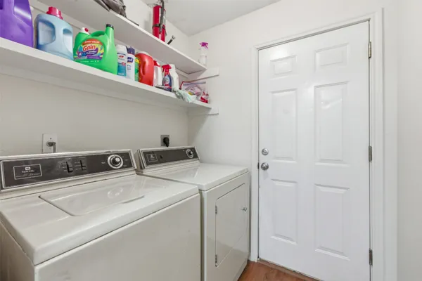 a utility room with dryer and washer