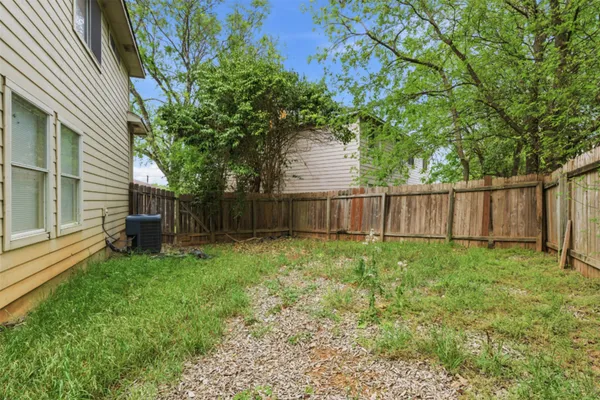 a view of a backyard with a garden