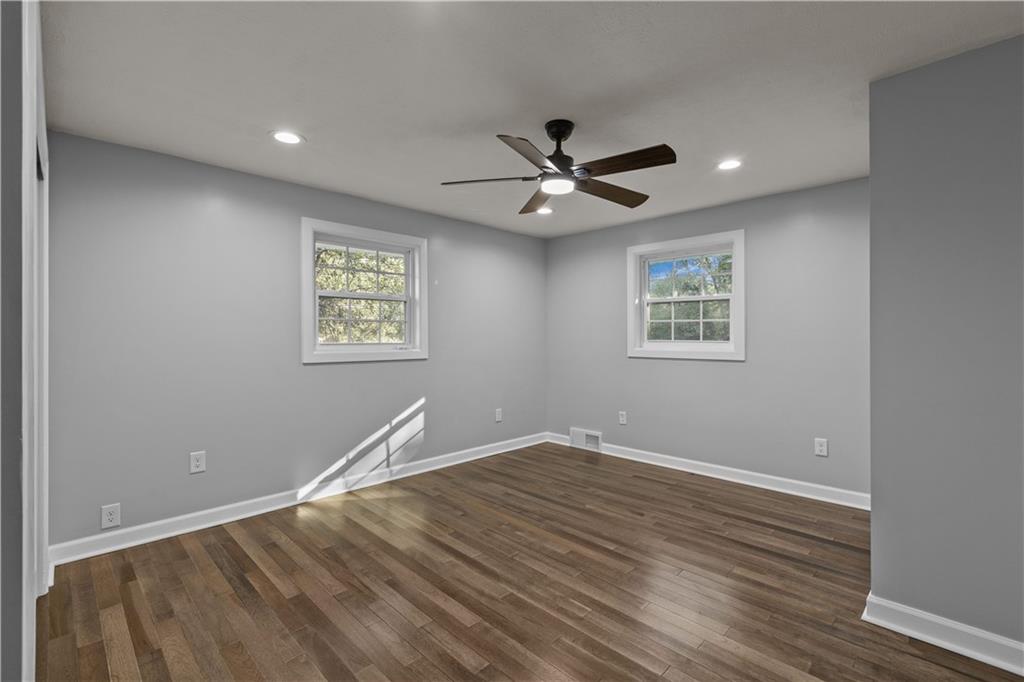 102 Maple Lane McKees Rocks, PA 15136 - Photo 15 of 36 a view of an empty room with a window and a ceiling fan