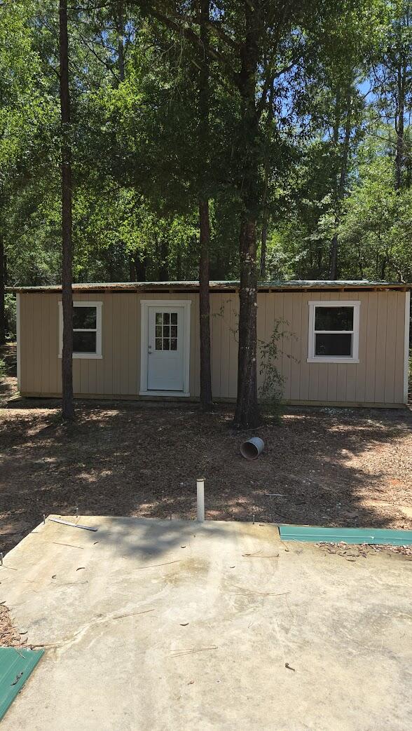 6045 Sand Hill Road Crestview, FL 32539 - Photo 3 of 21 a view of a house with a yard