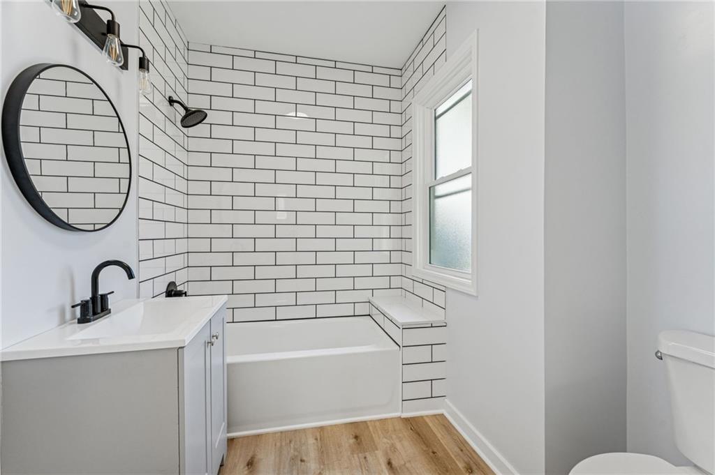 117 Owen Street McKees Rocks, PA 15136 - Photo 17 of 35 a bathroom with a sink a toilet and a bathtub