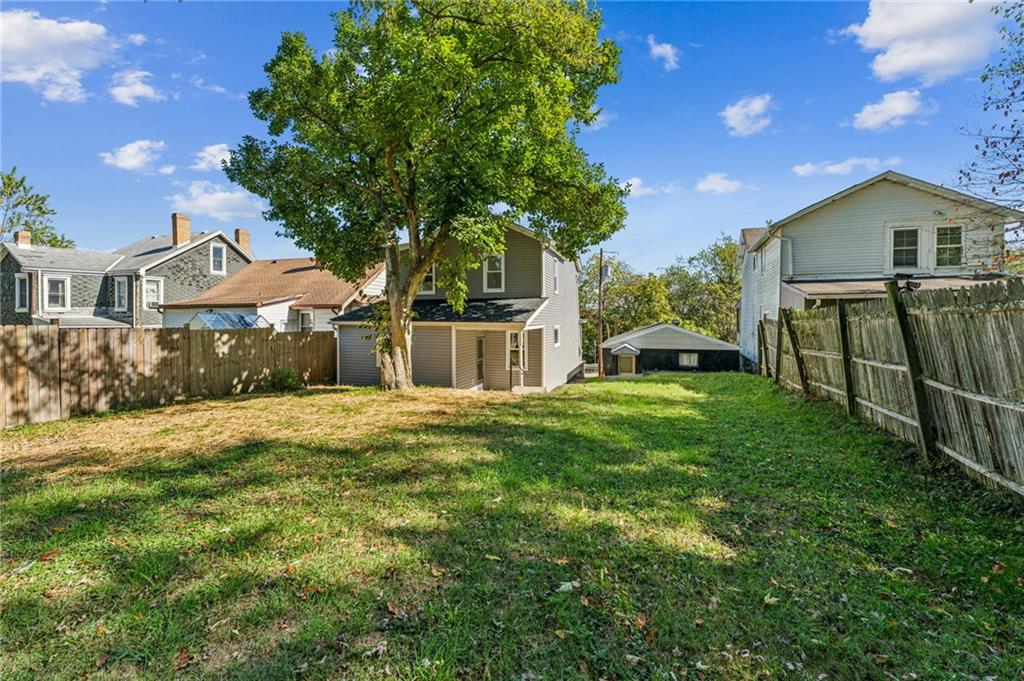 117 Owen Street McKees Rocks, PA 15136 - Photo 30 of 35 a front view of a house with yard and tree