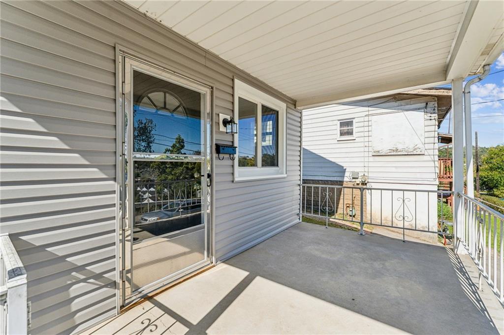 117 Owen Street McKees Rocks, PA 15136 - Photo 4 of 35 a view of a house with a balcony