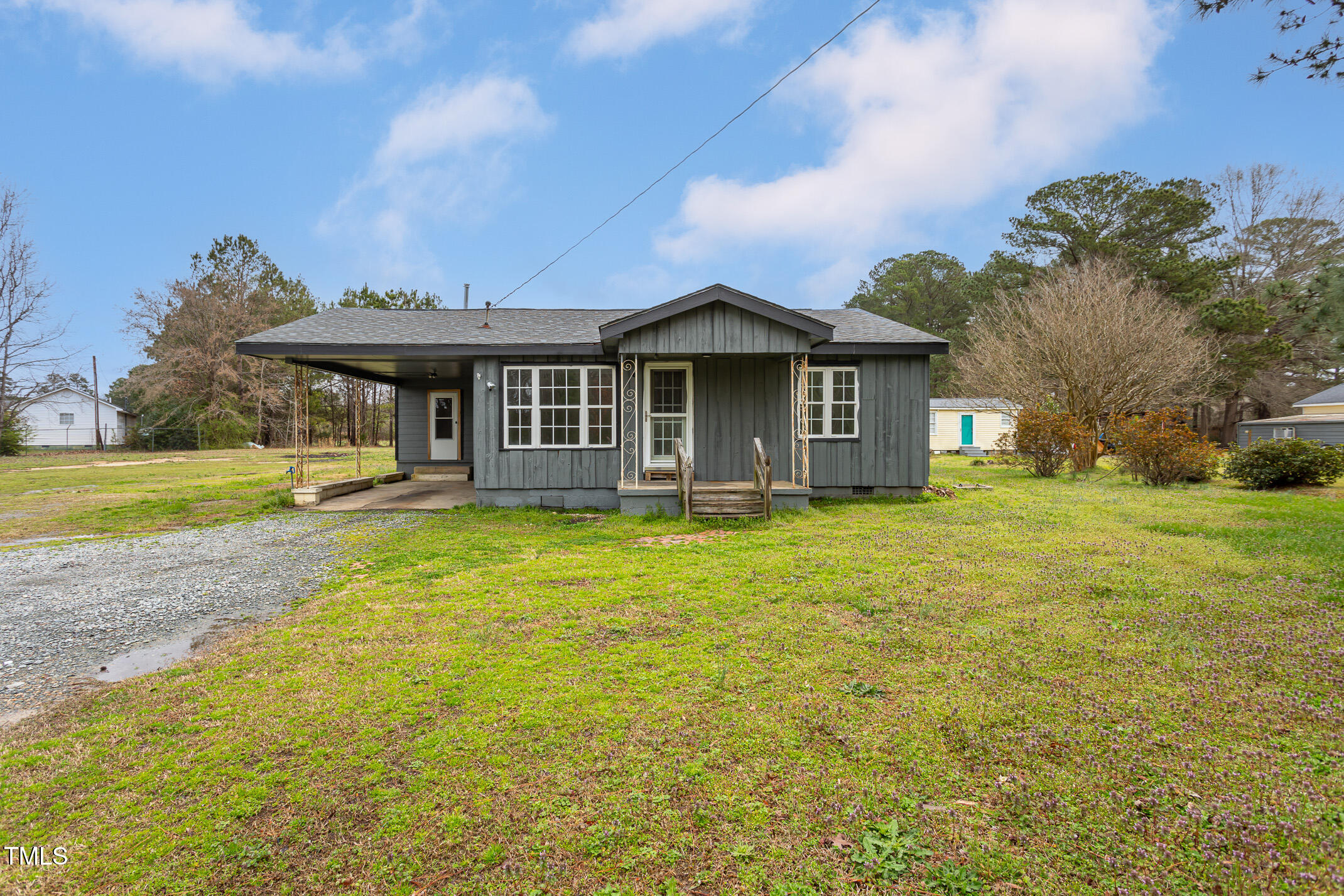 1239 Brogden Road Smithfield, NC 27577 - Photo 1 of 14 a front view of a house with garden