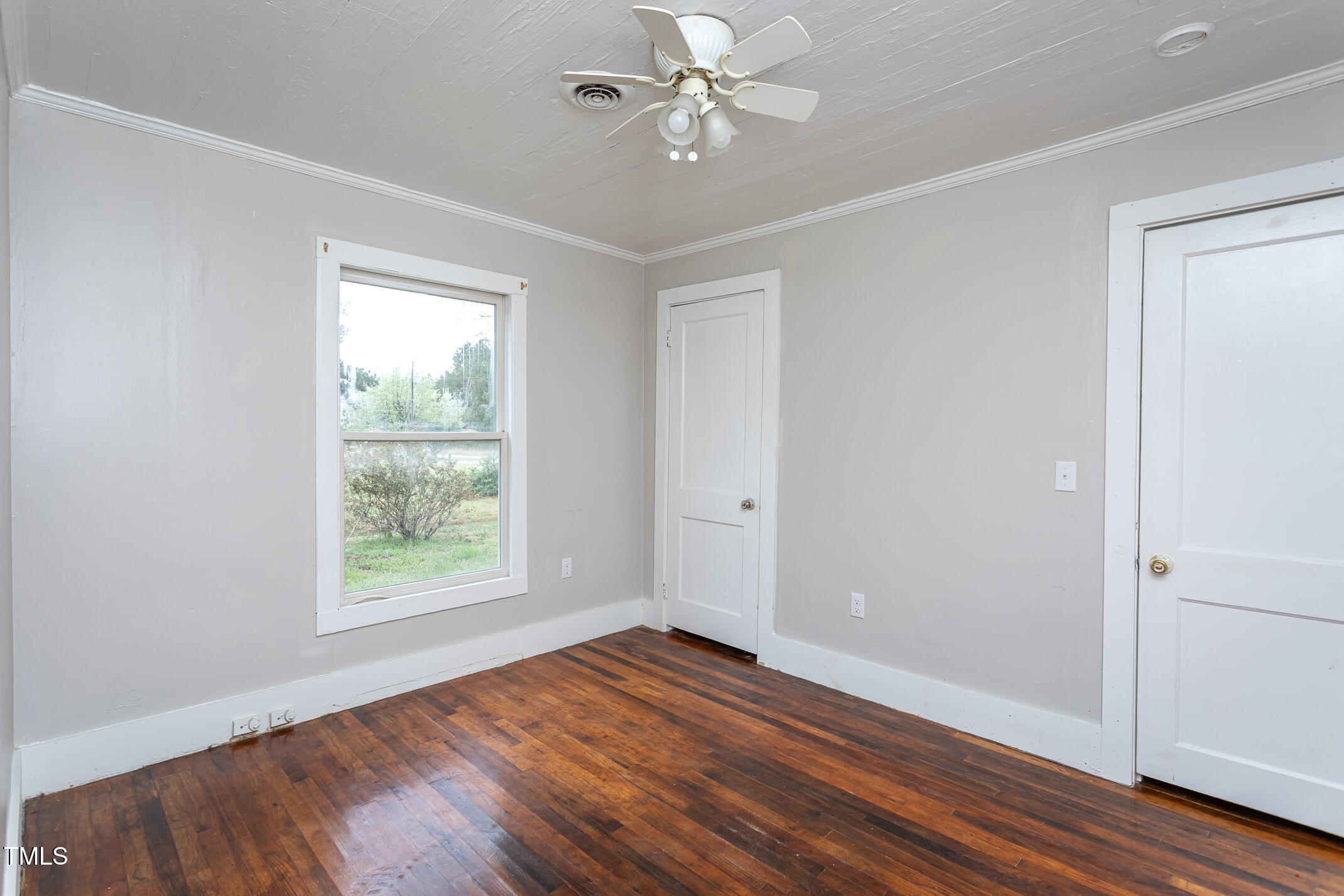 1239 Brogden Road Smithfield, NC 27577 - Photo 12 of 14 wooden floor in an empty room with a window