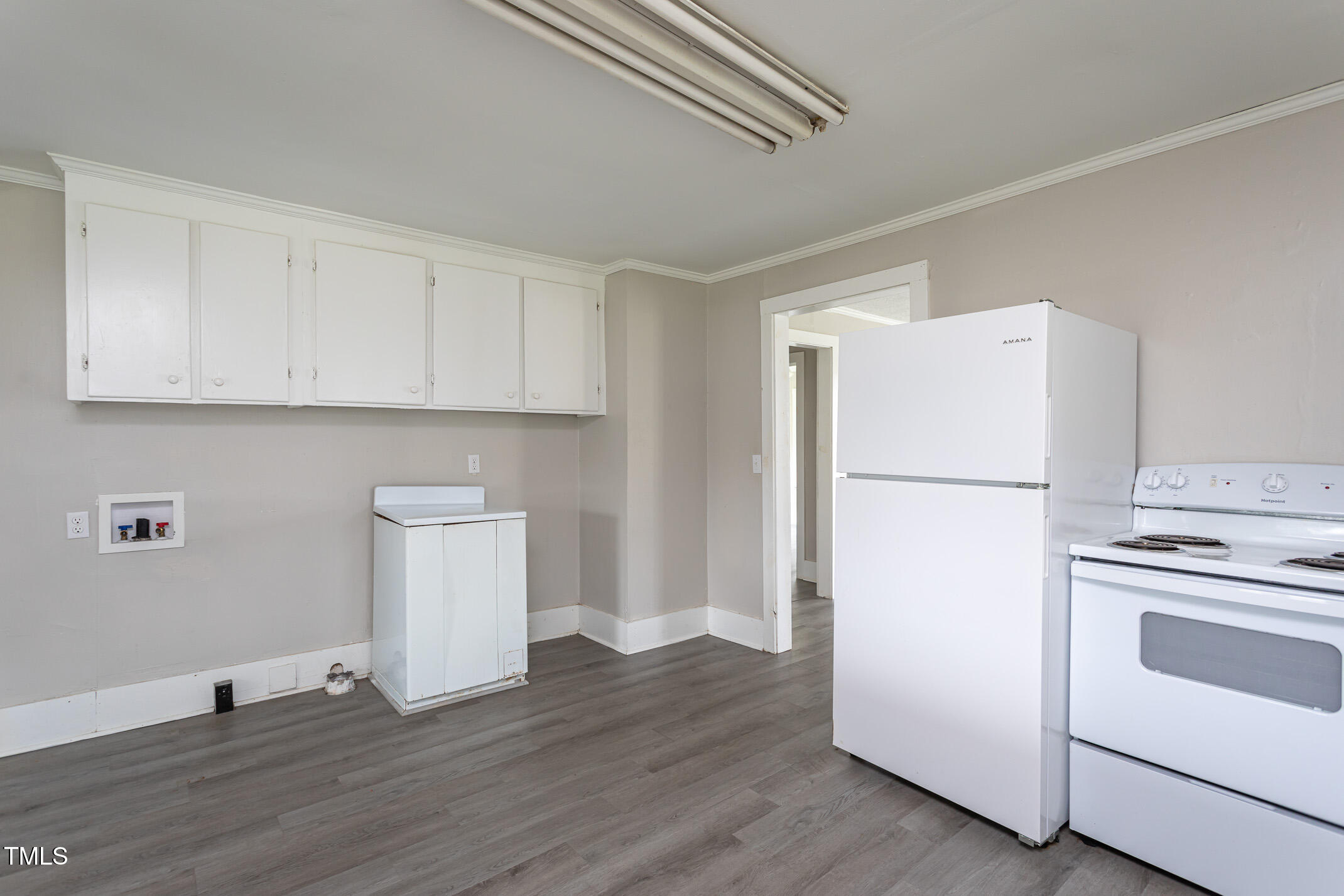 1239 Brogden Road Smithfield, NC 27577 - Photo 5 of 14 a view of kitchen and wooden floor